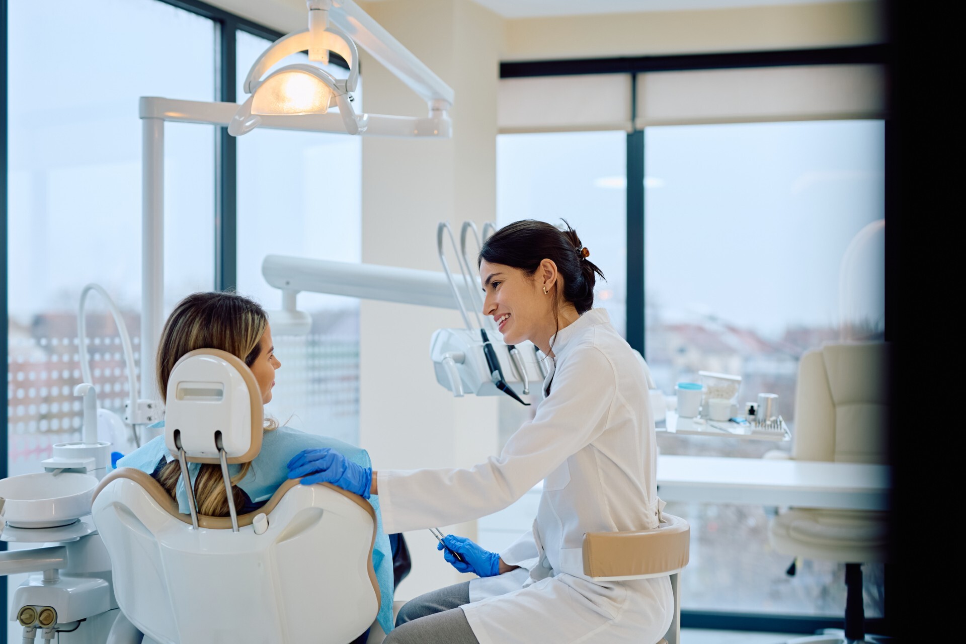Dentist attending patient Dentist attending patient